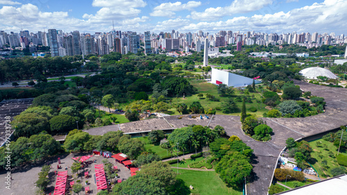 Fototapeta Naklejka Na Ścianę i Meble -  Aerial view of Ibirapuera Park in São Paulo, SP. Residential buildings around. Lake in Ibirapuera Park