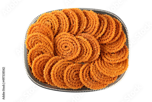 Traditional Indian Diwali snacks Chakali,murukku, Indian Traditional Tea Time Snack Chakli, a deep fried snack, It is known as Chakali, Murukku, Muruku, Murkoo, Chakri photo