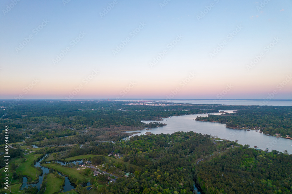View of Dog River and the city of Mobile at sunset 