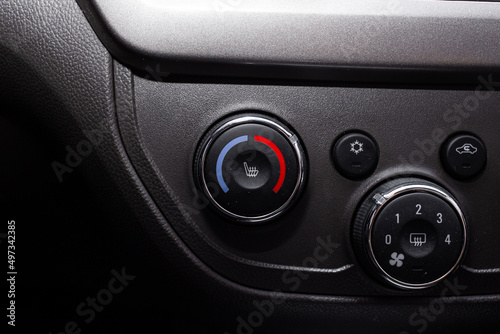 Car interior buttons, switches, seat belt © Tetiana Romaniuk