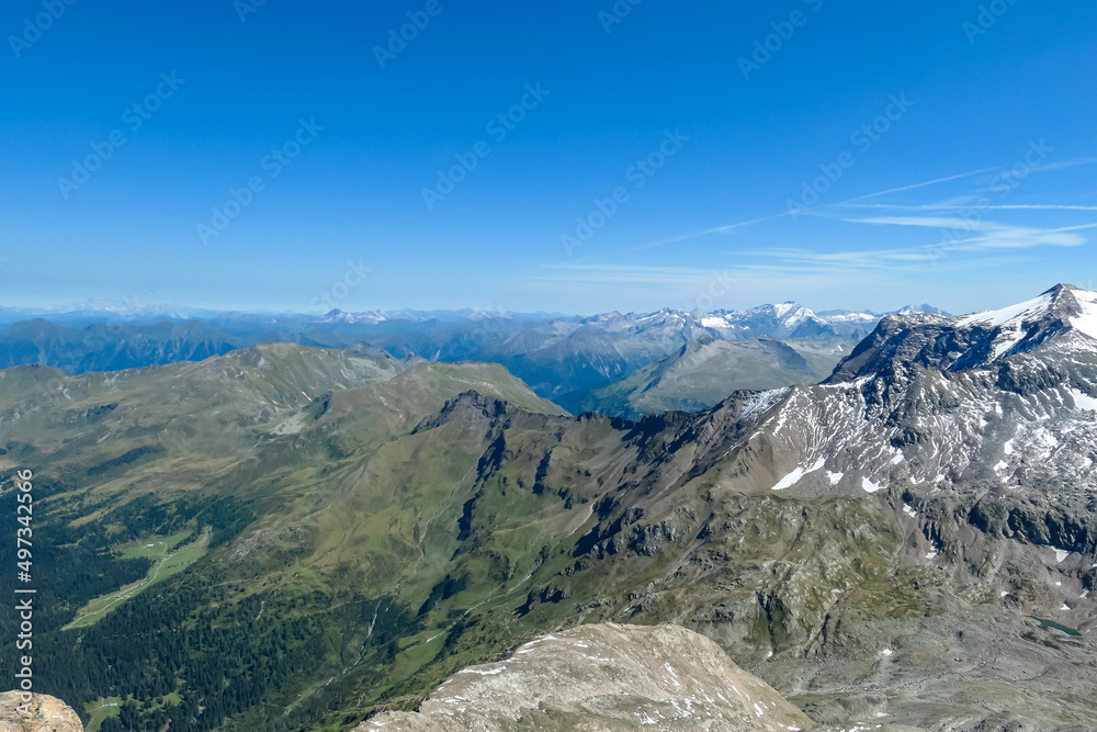 Fototapeta premium Panoramic view on the summit of Schareck in the High Tauern Alps in Carinthia and Salzburg, Austria, Europe. Mountain ranges in the Hohe Tauern National Park. High altitude landscape. Nature