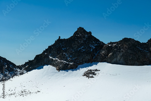 Panoramic view on the summit of Goldbergspitze in the High Tauern Alps in Carinthia and Salzburg, Austria, Europe. Mountain ranges in the Hohe Tauern National Park. High altitude landscape. Rock fall photo