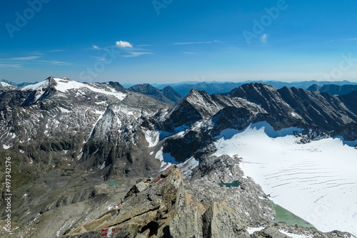 Scenic view on Hoher Sonnblick glacier in High Tauern mountains in Carinthia, Salzburg, Austria, Europe, Alps. Goldbergkees in Hohe Tauern National Park on a sunny day. Melting Kleinfleisskees photo