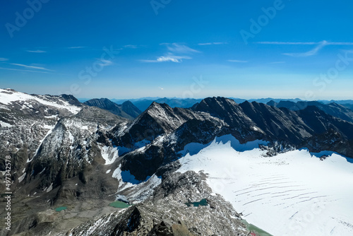 Scenic view on Hoher Sonnblick glacier in High Tauern mountains in Carinthia, Salzburg, Austria, Europe, Alps. Goldbergkees in Hohe Tauern National Park on a sunny day. Melting Kleinfleisskees photo
