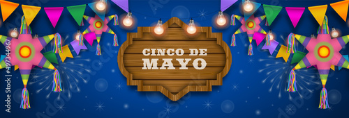 Cinco de mayo banner with colorful pinatas and pennants