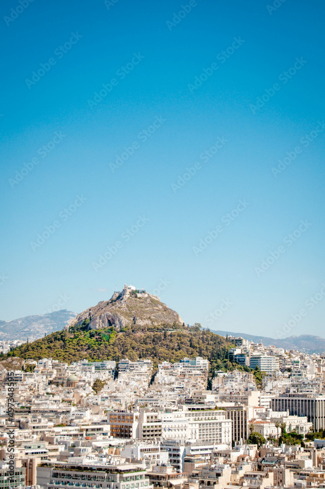 View of Athens city buildings and Lycabettus Hill, Greece