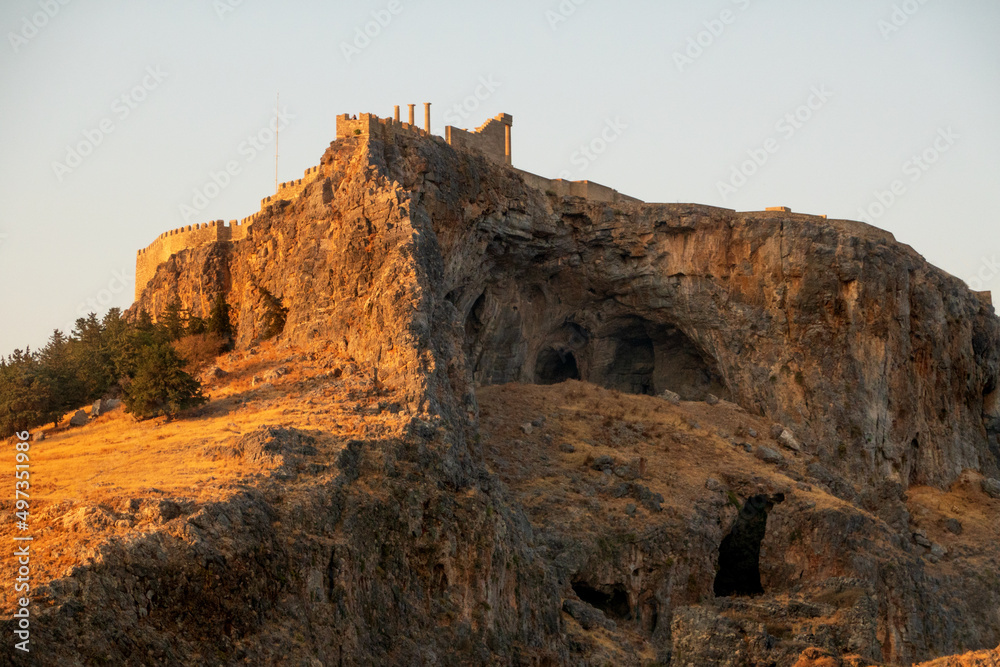 Views on Lindos castle on the top of big rock in the evening time,  Rhodes, Greece