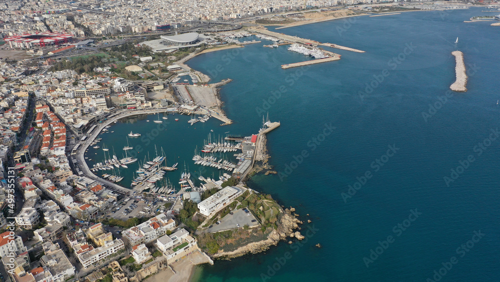 Aerial drone photo of iconic round shaped picturesque port of Mikrolimano with anchored sail boats and yachts after renovation, Piraeus, Attica, Greece