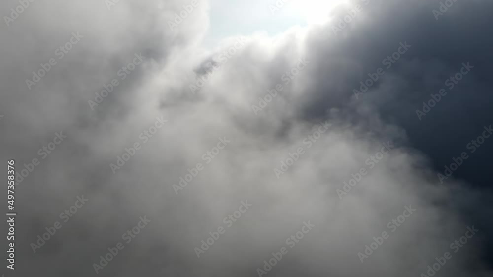 Aerial fly in the morning foggy cloud. Inspiration motivation concept