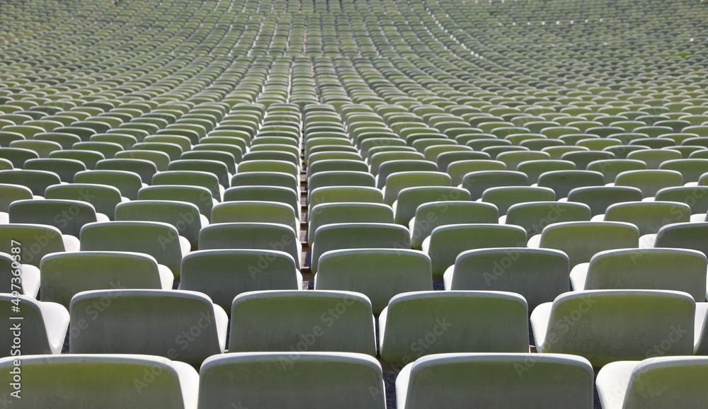 Obraz premium endless series of empty seats in the stadium