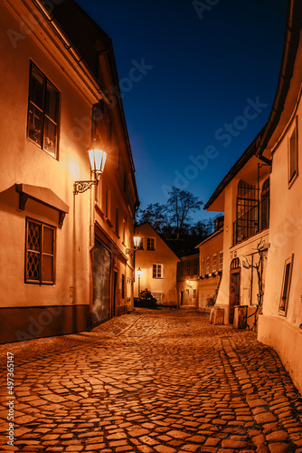 Quarter called New World in Prague consists of winding streets and small picturesque houses dating back to Middle Ages.Charming place with romantic atmosphere.Evening city illuminated buildings
