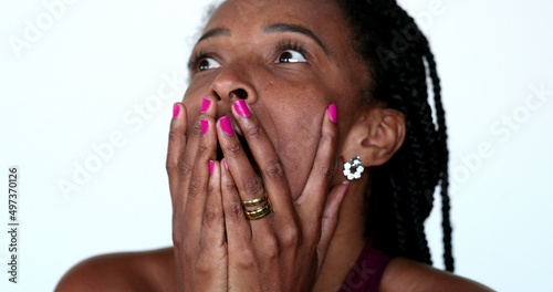 Photos Anxious black African woman reacting to HORRIBLE news with HORROR and SHOCK
