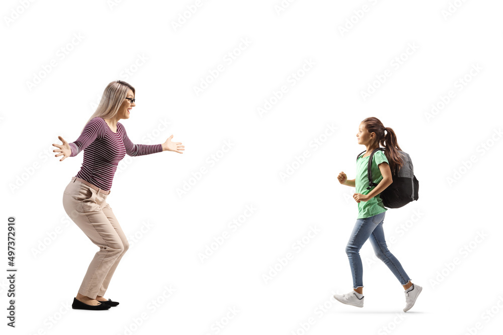 Full length profile shot of a mother waiting to hug daughter