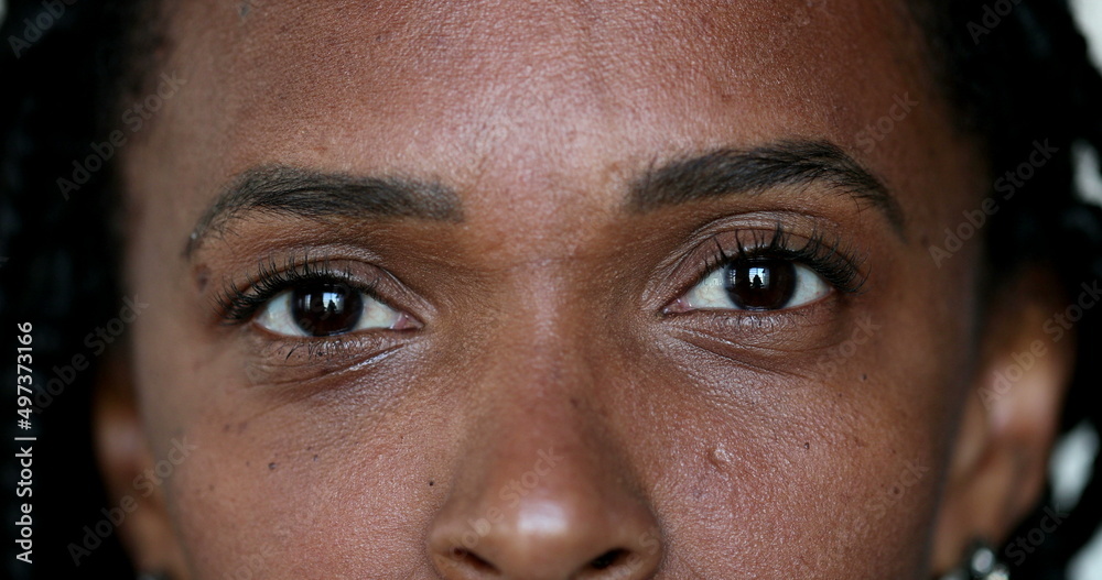 African woman closing eyes close-up