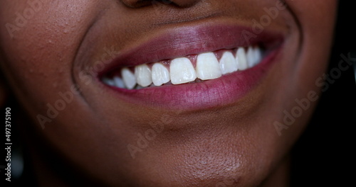 African ethnicity teen girl smiling close-up mouth