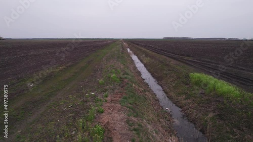 Irrigation and drainage canals are used as a channel for delivering water to field cultivated land.