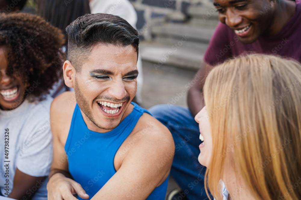 Young diverse people having fun outdoor laughing together Focus on