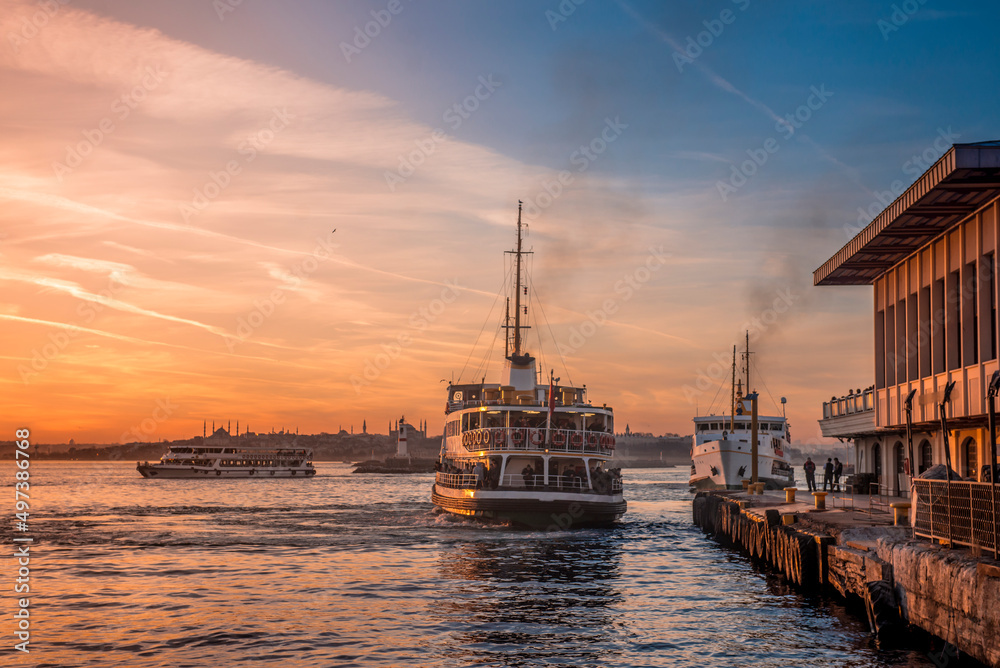 classical passenger ferries at sunset in istanbul