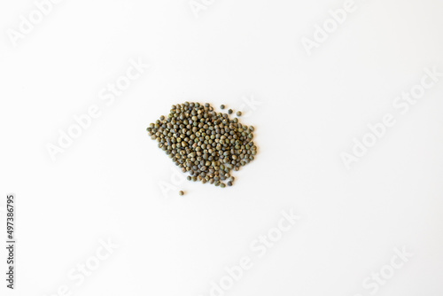 Okra seeds on white isolated background