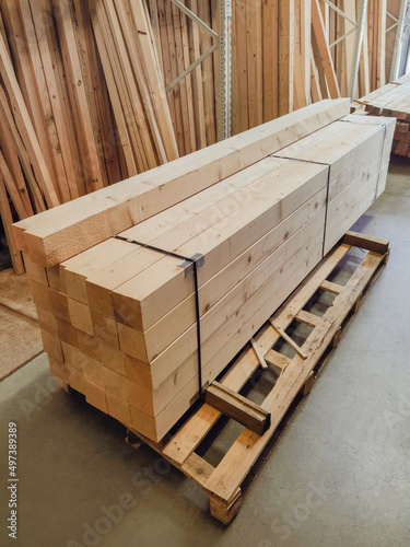stacked wooden boards in a woodworking industry. stacks with pine lumber. folded edged board. wood harvesting shop. timber for construction, increase in timber prices,