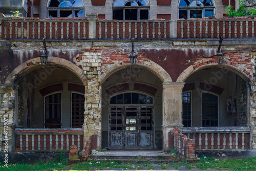 Abandoned, decaying historical heritage of the 19th century, an old ownerless estate. Background with copy space photo