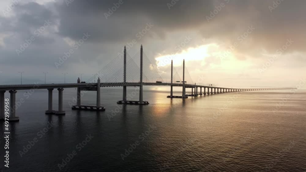 Slowly move toward Penang Second Bridge in dramatic sunrise cloudy morning Slowly move toward Penang Second Bridge in dramatic sunrise cloudy morning