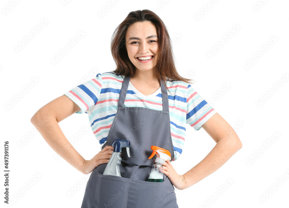 Young woman with detergents isolated on white Young woman with detergents isolated on white