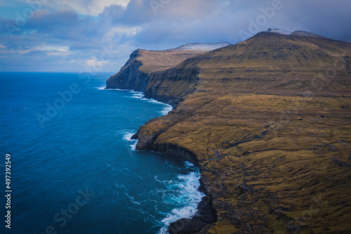 Steep coast of the islands of Eidi on Streymoy Island. Volcanic archipelago in the Atlantic Ocean, Faroe Islands. November 2021