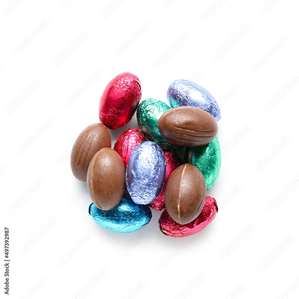 Heap of chocolate Easter eggs on white background Heap of chocolate Easter eggs on white background