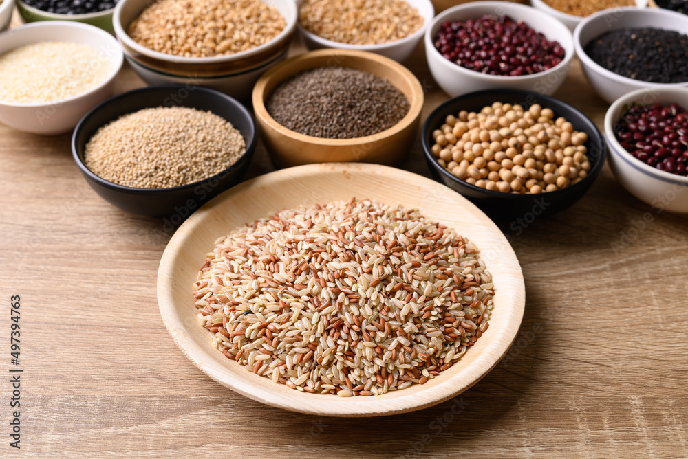 Various cereal, grain, bean, legume and seed in bowl on wooden background, Food ingredients Various cereal, grain, bean, legume and seed in bowl on wooden background, Food ingredients