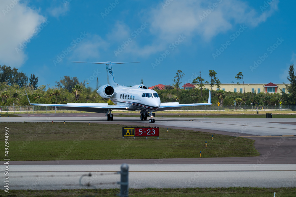 Fototapeta premium Private Jet Sitting On The Runway At An Airport AFter Landing