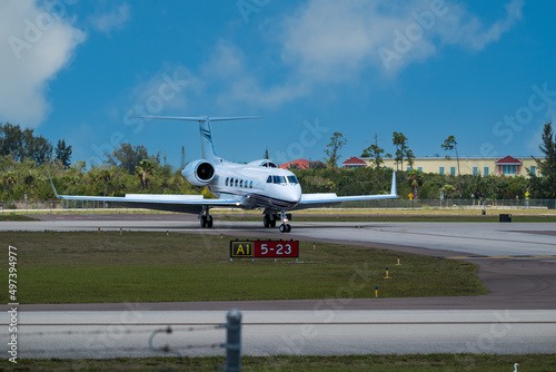 Private Jet Sitting On The Runway At An Airport AFter Landing