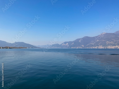 Bergamo, Italy: 10-02-2022: Panoramic of Lake Iseo, the fourth largest lake in Lombardy, Italy, fed by the Oglio River.
