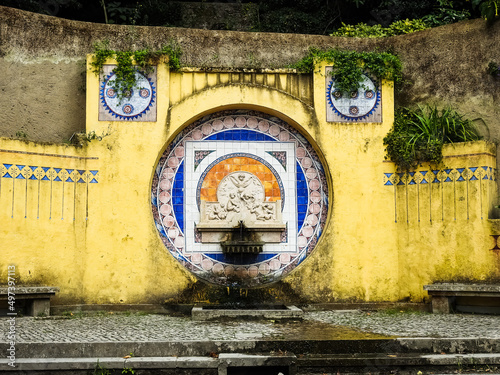 Sintra, Portugal - July 27 2019: Quinta da Regaleira Palace water fountain photo