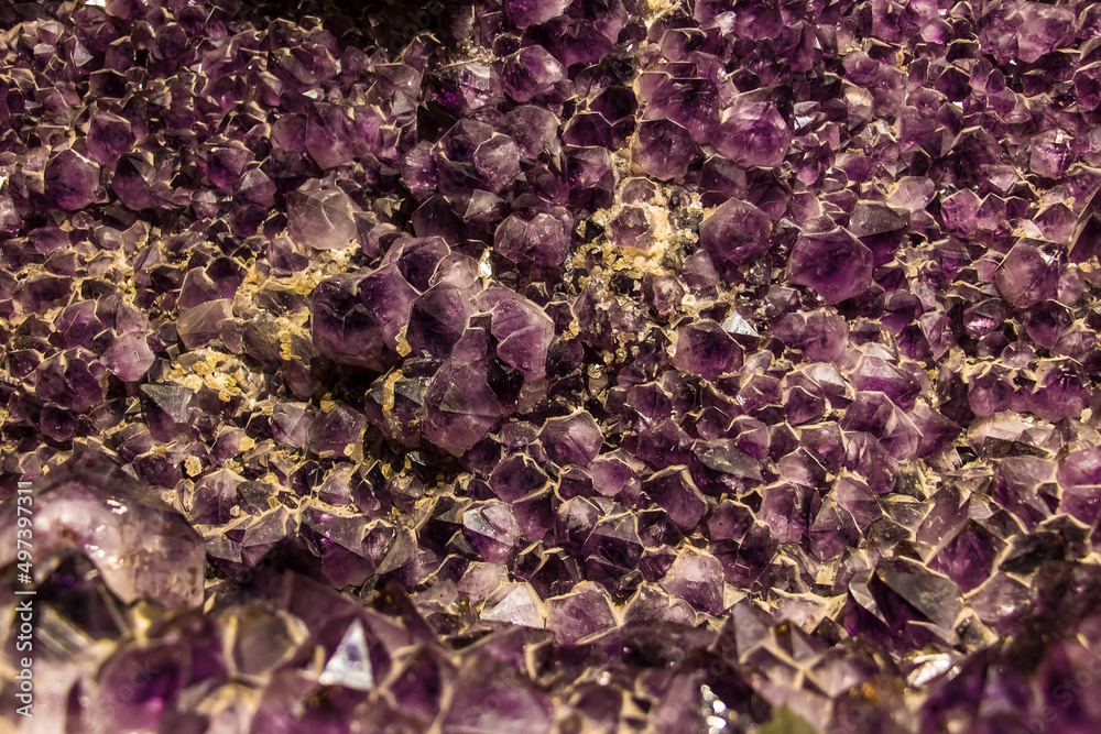 Amethyst geode mineral specimen. Violet texture from Natural Amethyst. Amethyst geode mineral specimen. Violet texture from Natural Amethyst.