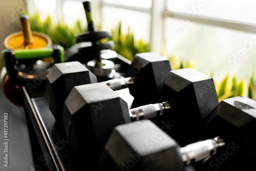 Black dumbbells for sports Sports, sports nutrition, healthy eating, diet