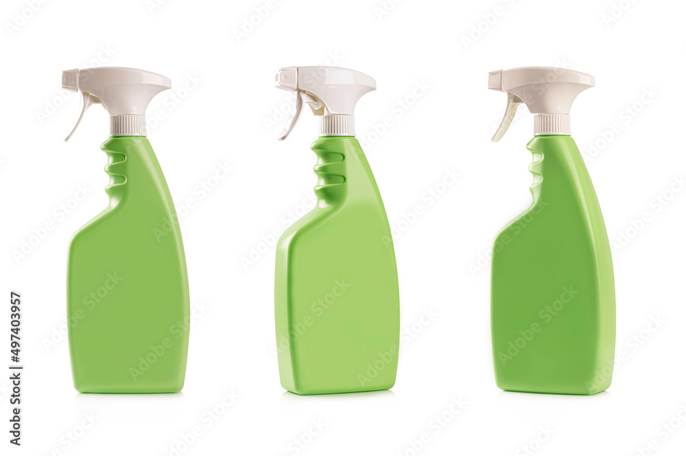 Green spray bottle on white background. Green spray bottle on white background.