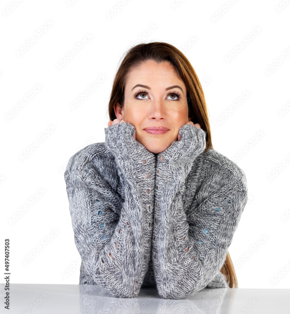 She possibility in everything. Studio shot of an attractive young woman daydreaming against a white background. She possibility in everything. Studio shot of an attractive young woman daydreaming against a white background.