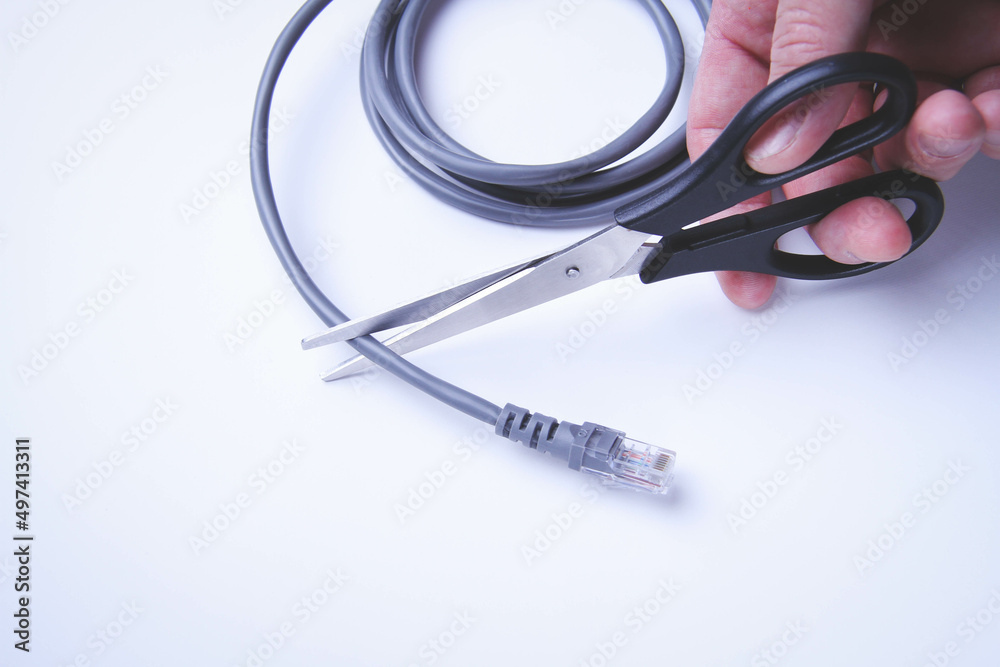 Scissors cut internet cable. Internet shutdown. Cut internet cable. Scissors cut internet cable. Internet shutdown. Cut internet cable.