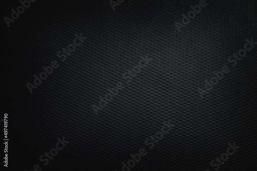 Pattern of black plastic or metal texture background for design.