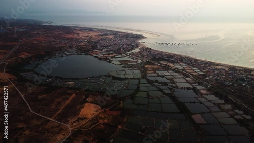 Scenic aerial view on shrimp farm ponds on Son Hai coast, Vietnam at sunrise photo