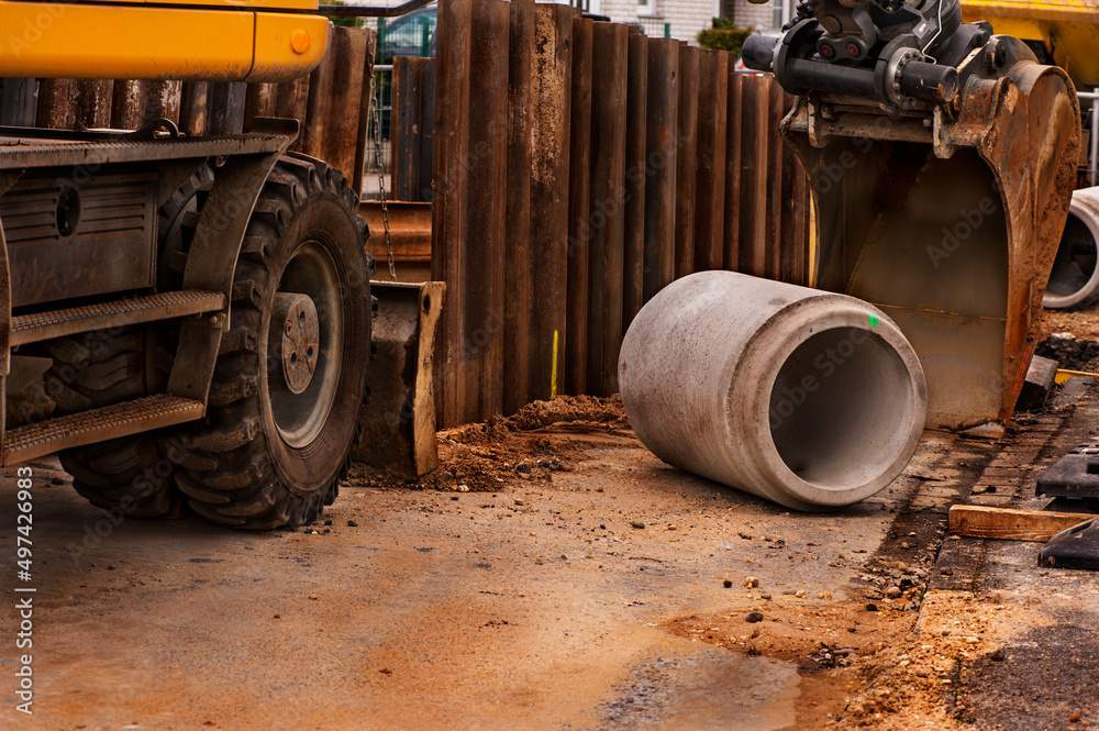 Installing new sewer pipes.
Big pipe or tube for water sewer on construction site during road repair
Installing new sewer pipes.
Big pipe or tube for water sewer on construction site during road repair