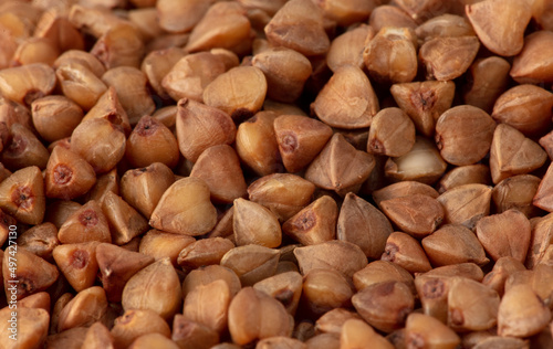 Close-up of buckwheat groats as background.