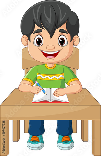 Cartoon little boy studying on the table