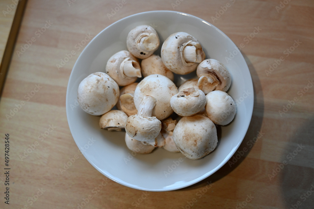 rustic White organic Mushrooms. plant based cooking ingredients. vegan and vegetarian cuisine. food prep rustic White organic Mushrooms. plant based cooking ingredients. vegan and vegetarian cuisine. food prep