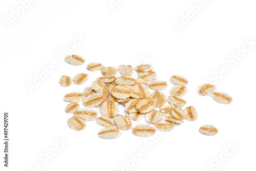 Heap of dry rolled oatmeal isolated