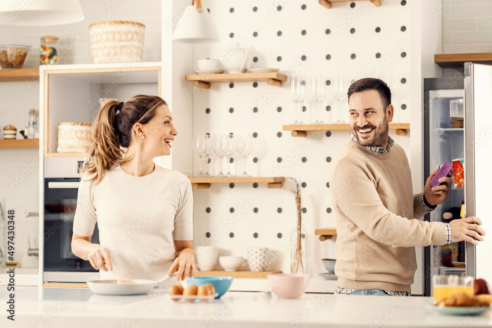 Spouses making healthy breakfast at home. Spouses making healthy breakfast at home.
