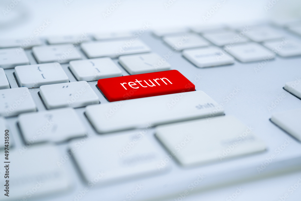 white computer keyboard and red return button white computer keyboard and red return button