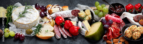 Canvas Print Appetizers assortment on dark background.