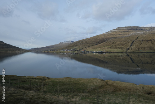 Beautiful breathtaking landscape nature scenery panoramic view of fjords, coast, mountains and villages on adventure natural Reserve Faroe Islands in Atlantic Ocean photo